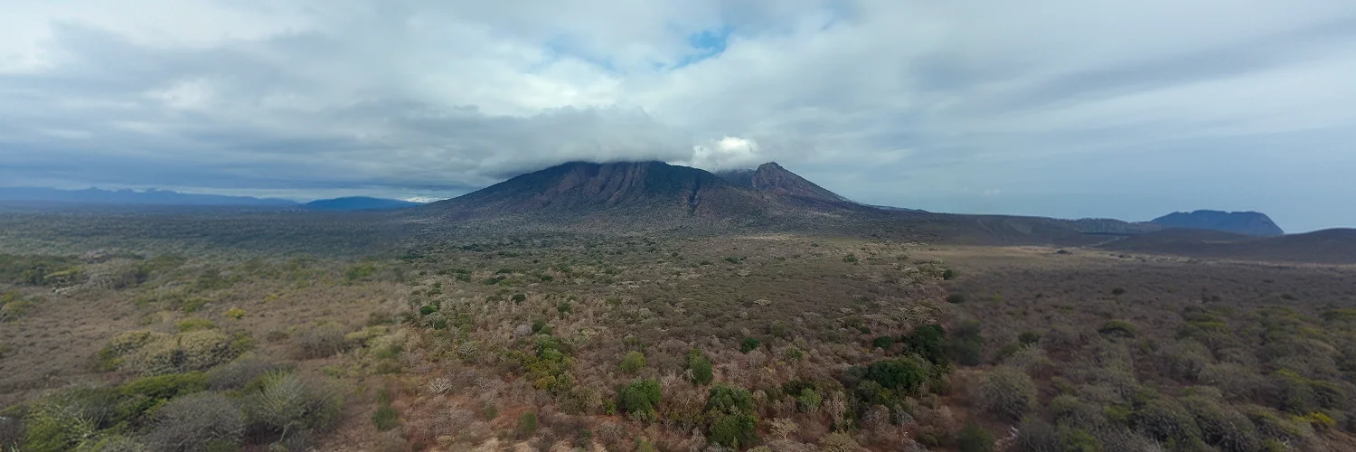 breathtaking-view-mountains-bright-blue-cloudy-sky 1.webp